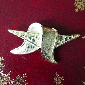 Gerry's vintage gold-tone ribboned atomic MCM brooch